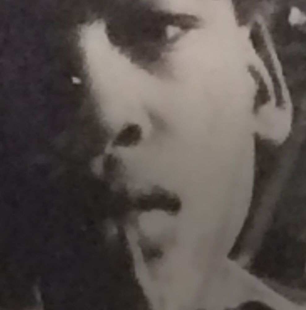 Black and white portrait of a young Eli Davis, photographed by his father